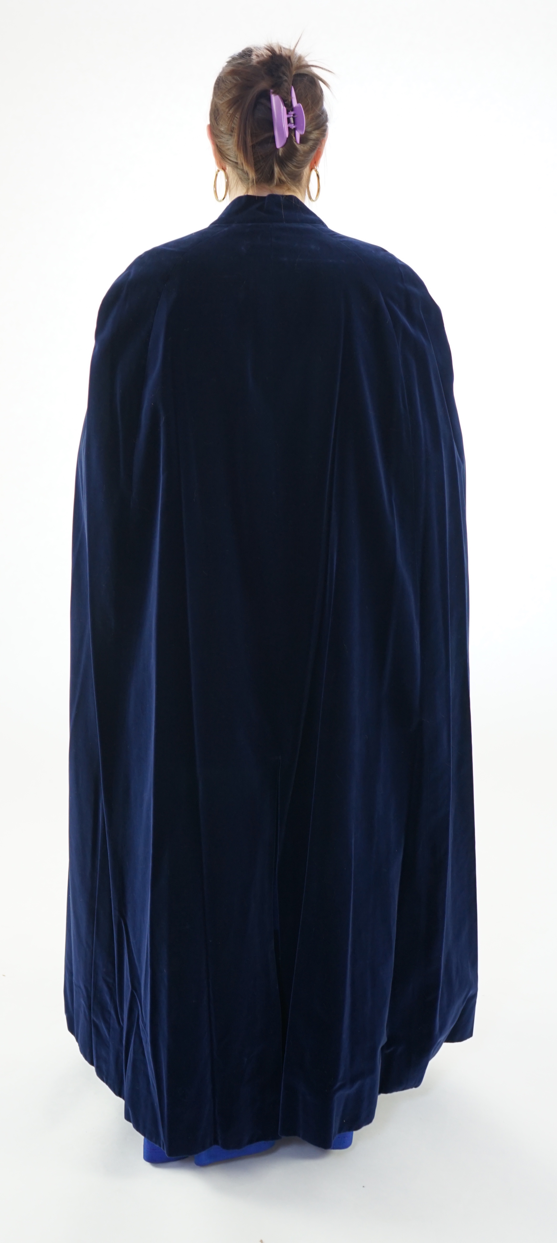A lady's midnight blue long evening cape. Maindel label